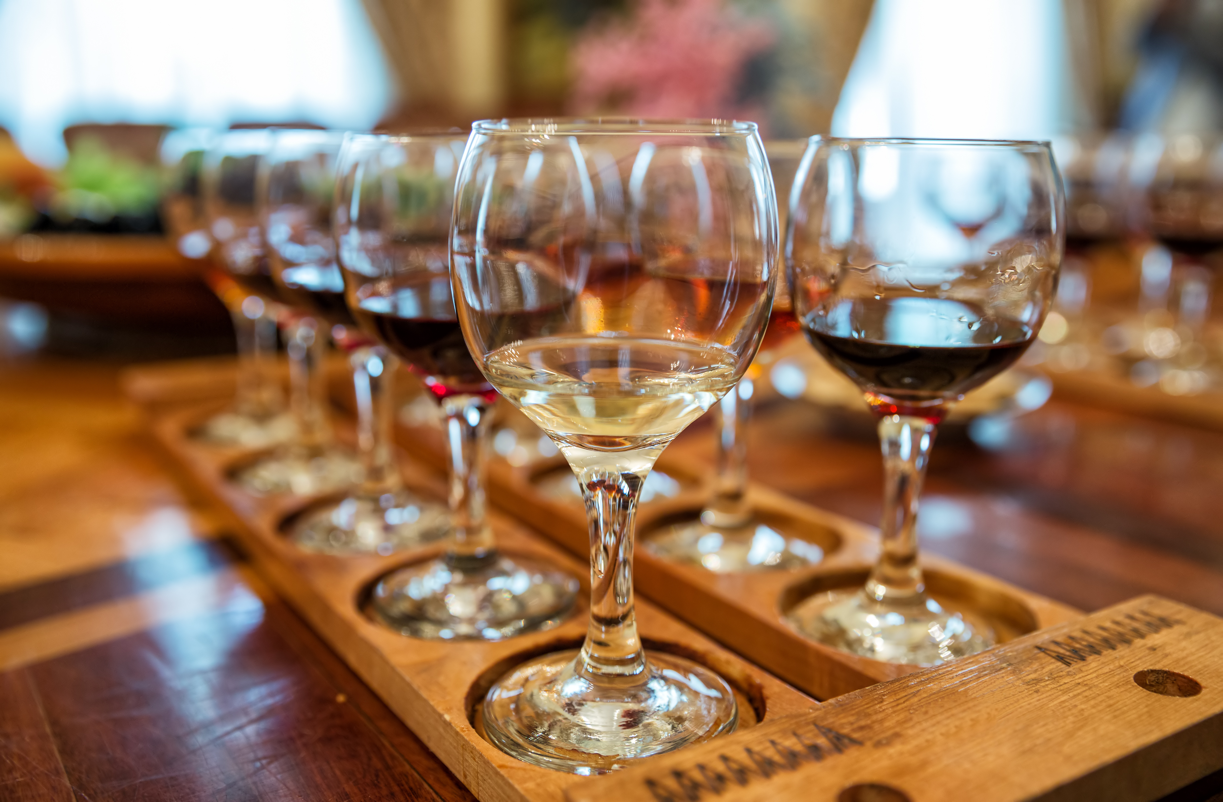 Wine tasting. Several glasses on the table with different kinds of wine